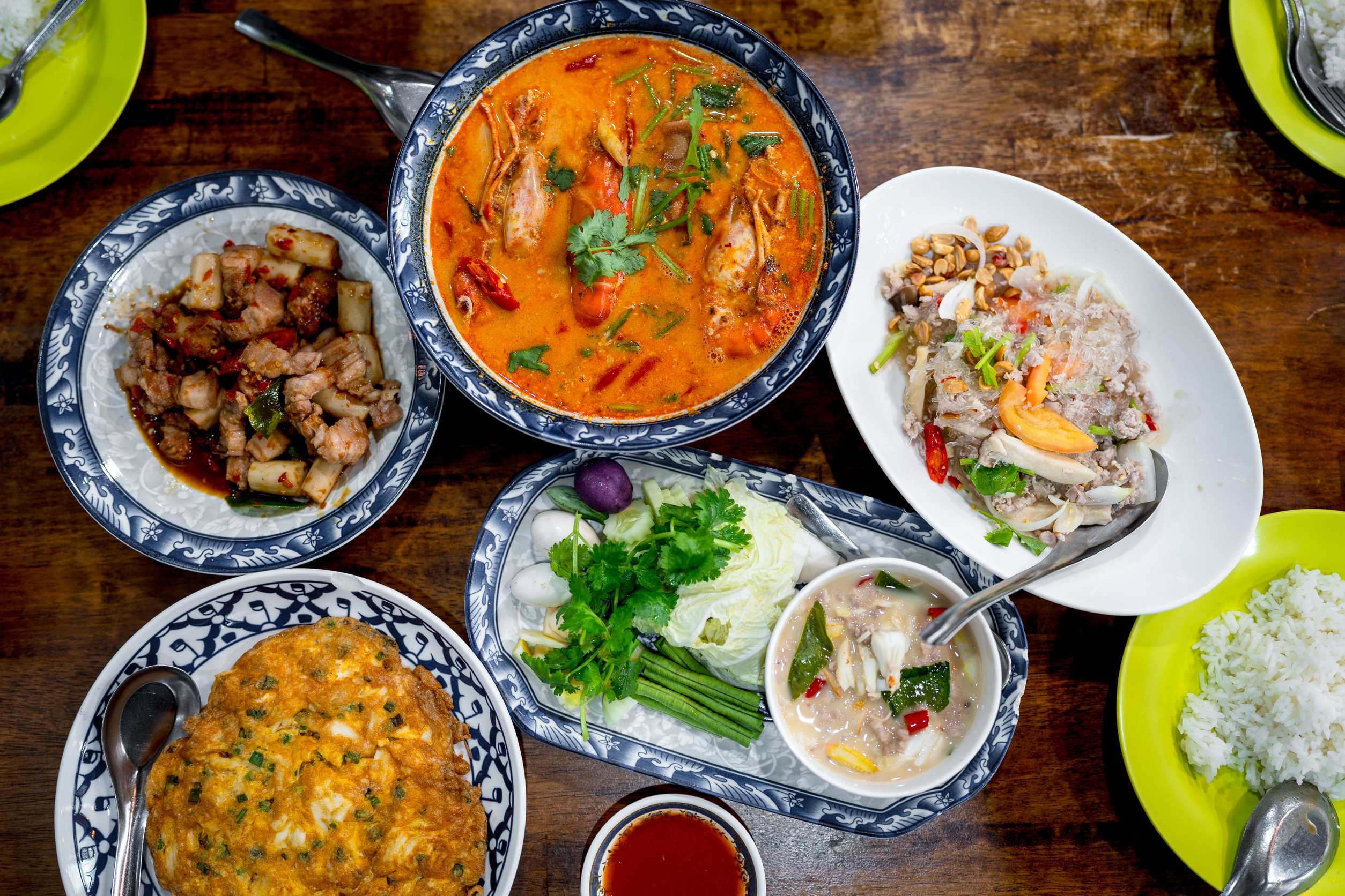 An Assortment Of Thai Food On A Table