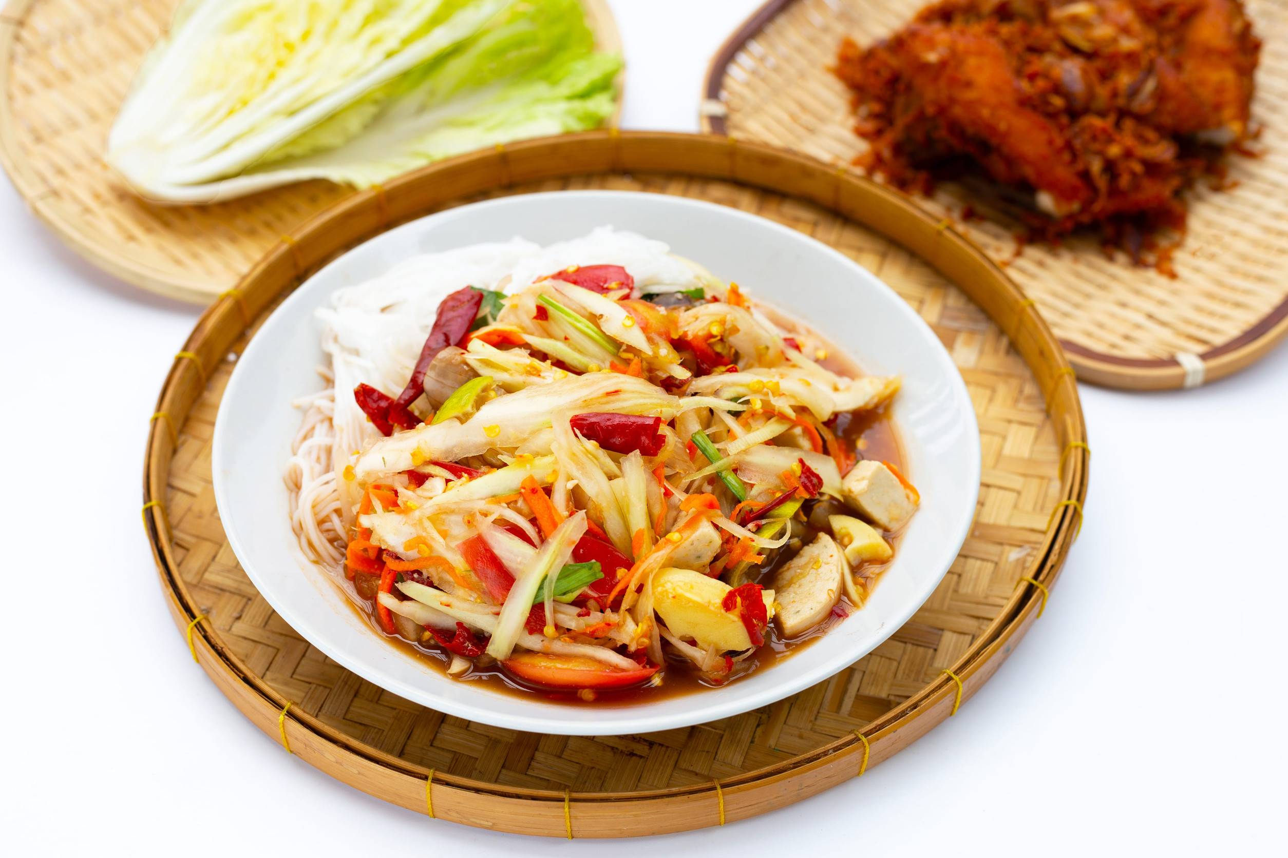 Som Tum Being Served With Additional Salad Som Tum Being Served With Additional Salad