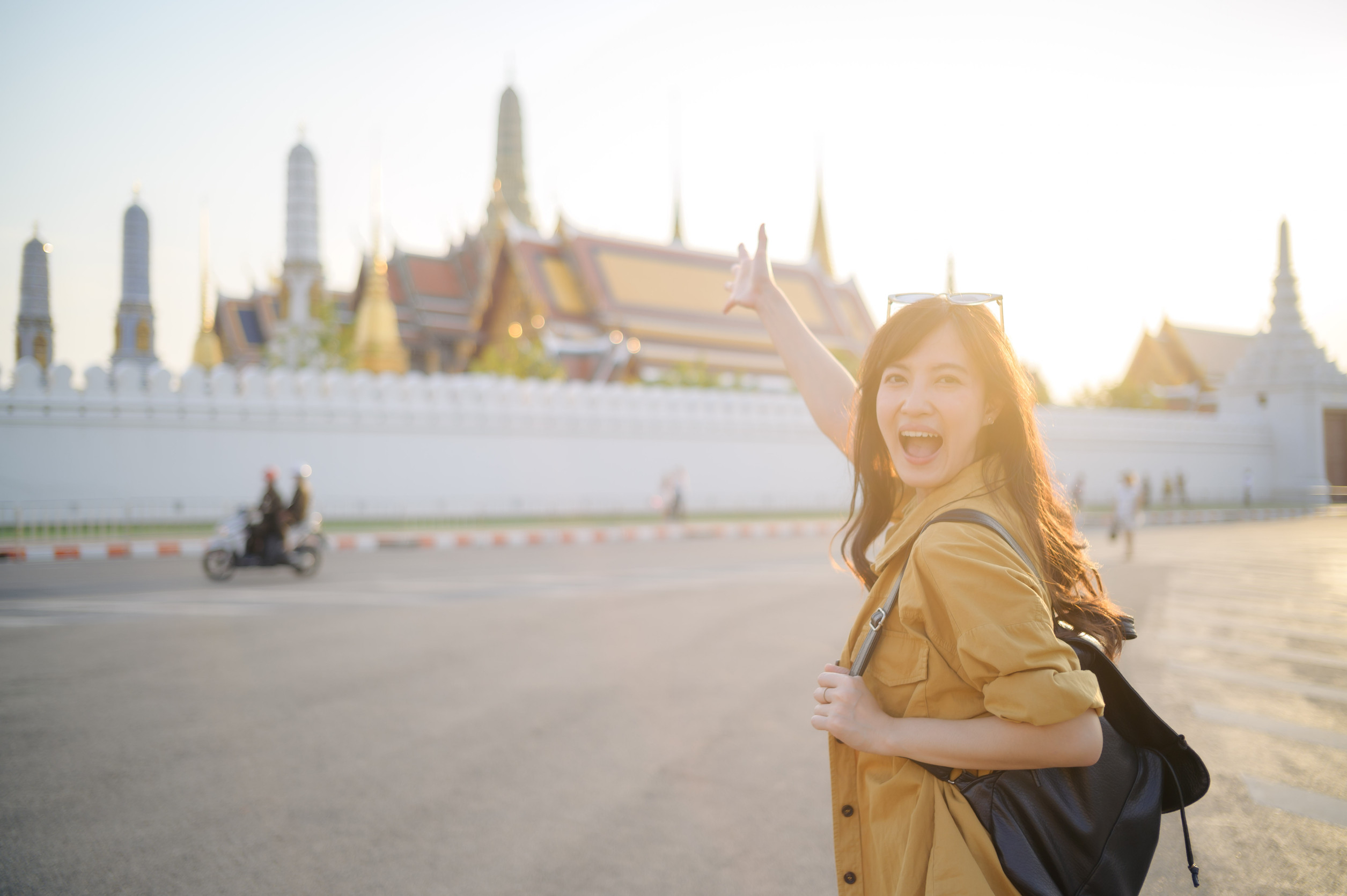 Travel Concept Shows Joyful Woman Pointing At Historic Temple