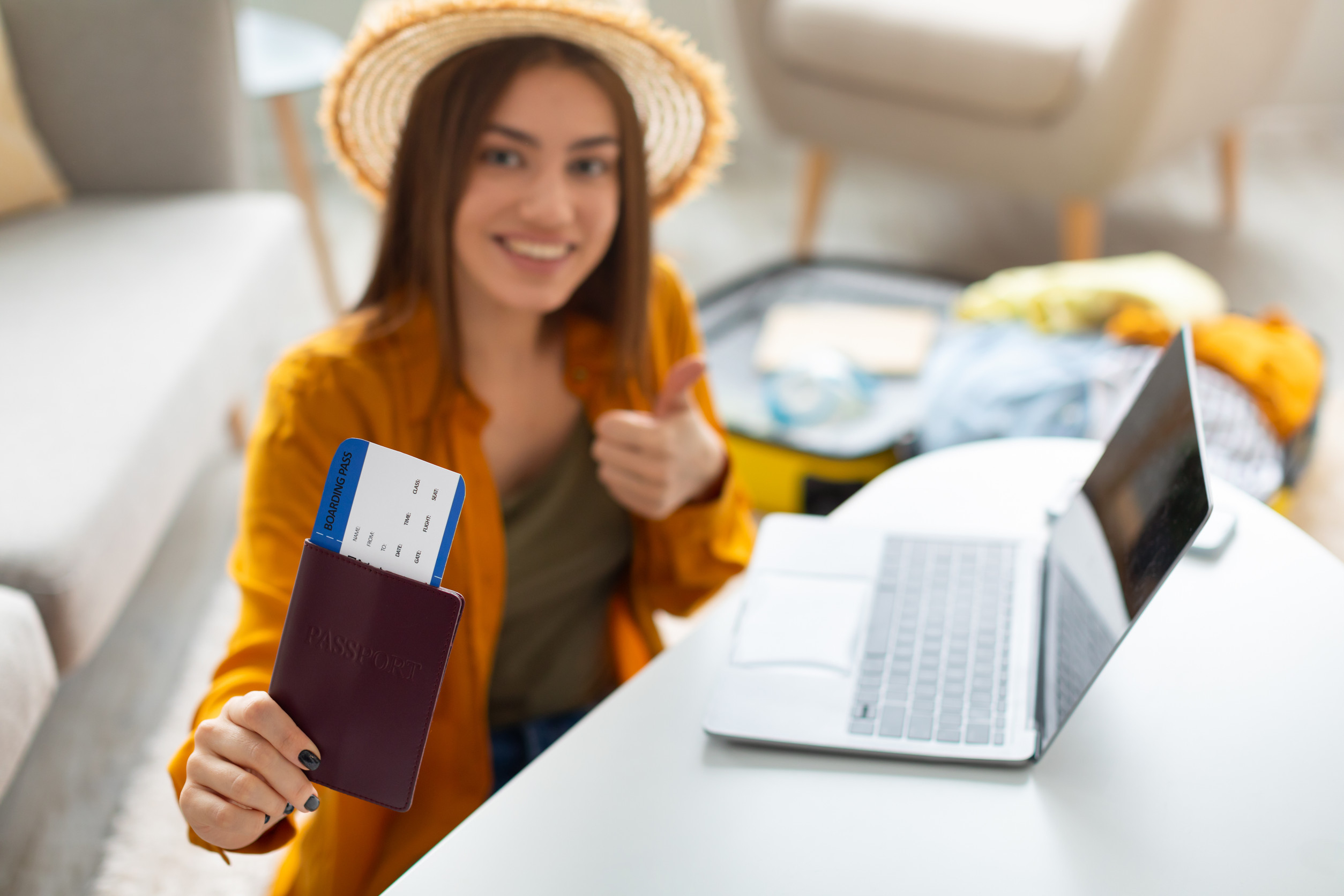 Woman Showing Passport And Ticket At Camera