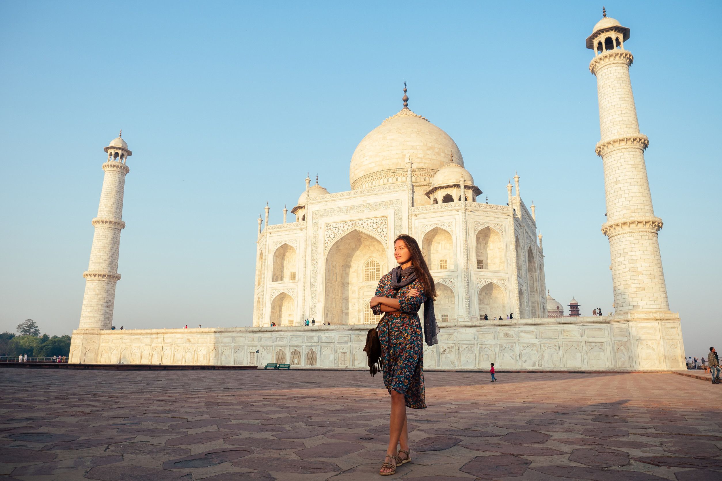 Young Girl Tourist Looking To The Taj Mahal In Agra India